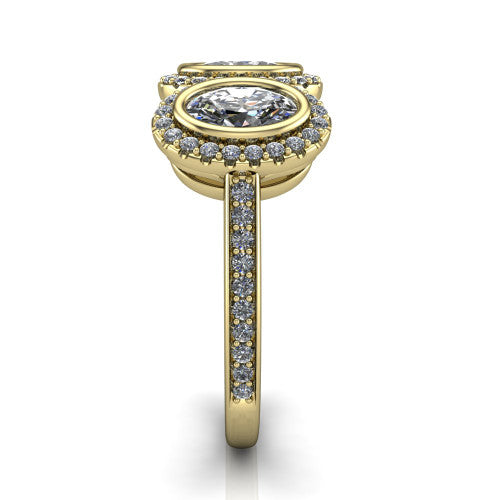 Aviana oval three stone halo engagement ring in 18K Yellow Gold, side profile showing the pav&eacute; band, filigree scrollwork gallery, and three-stone halo in profile