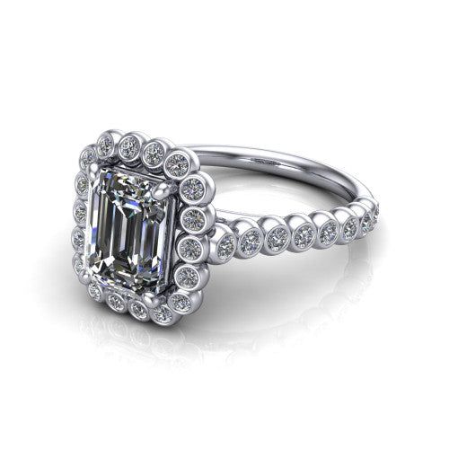 Maren emerald bezel bubble halo engagement ring in Platinum, three-quarter perspective showing the emerald center in a scalloped bezel-set bubble halo above a bezel-set band