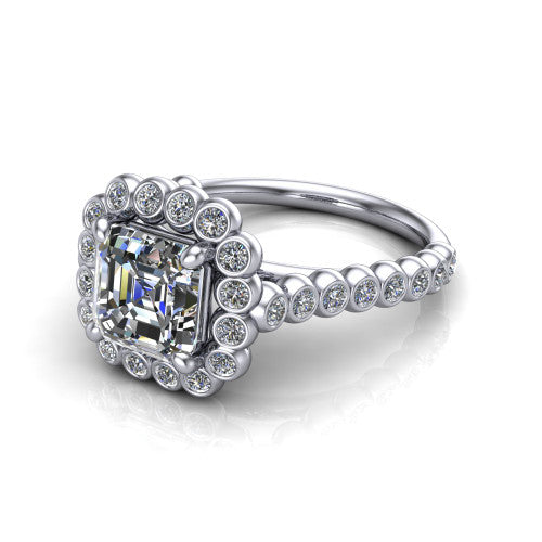 Maren square emerald bezel bubble halo engagement ring in 14K White Gold, three-quarter perspective showing the square emerald center in a scalloped bezel-set bubble halo above a bezel-set band