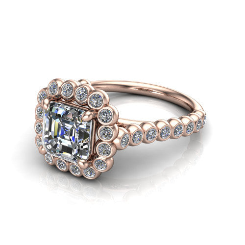 Maren square emerald bezel bubble halo engagement ring in 14K Rose Gold, three-quarter perspective showing the square emerald center in a scalloped bezel-set bubble halo above a bezel-set band