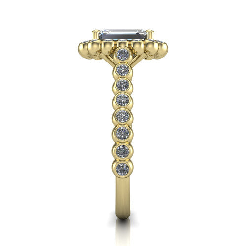 Maren emerald bezel bubble halo engagement ring in 18K Yellow Gold, side profile showing the bezel-set bead band with milgrain detailing and the bubble halo in profile