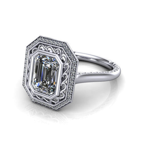Collins emerald vintage halo engagement ring in 18K White Gold, three-quarter perspective showing the emerald center in a filigree-lined pav&eacute; halo above an engraved plain band