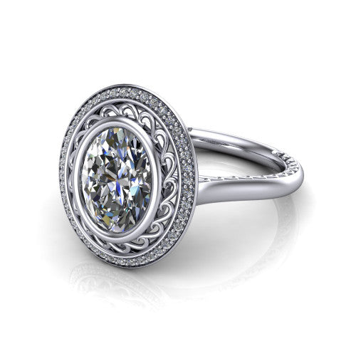 Collins oval vintage halo engagement ring in 18K White Gold, three-quarter perspective showing the oval center in a filigree-lined pav&eacute; halo above an engraved plain band
