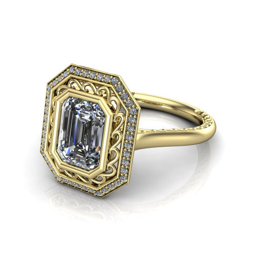 Collins emerald vintage halo engagement ring in 18K Yellow Gold, three-quarter perspective showing the emerald center in a filigree-lined pav&eacute; halo above an engraved plain band