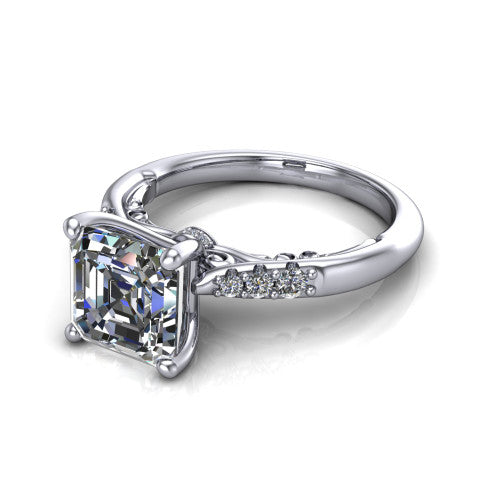 Jimena square emerald solitaire engagement ring in Platinum, three-quarter perspective showing the square emerald center raised on claw prongs above pav&eacute; shoulders