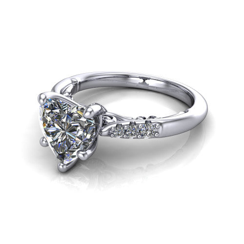 Jimena heart solitaire engagement ring in 14K White Gold, three-quarter perspective showing the heart center raised on claw prongs above pav&eacute; shoulders