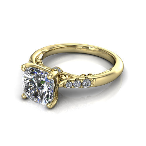 Jimena cushion solitaire engagement ring in 18K Yellow Gold, three-quarter perspective showing the cushion center raised on claw prongs above pav&eacute; shoulders