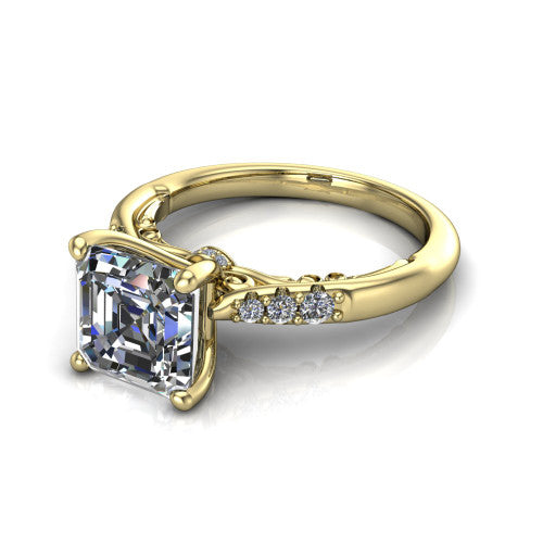 Jimena square emerald solitaire engagement ring in 14K Yellow Gold, three-quarter perspective showing the square emerald center raised on claw prongs above pav&eacute; shoulders
