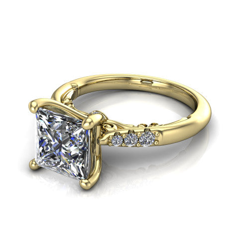 Jimena princess solitaire engagement ring in 14K Yellow Gold, three-quarter perspective showing the princess center raised on claw prongs above pav&eacute; shoulders