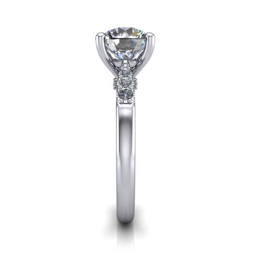 Jimena round solitaire engagement ring in 14K White Gold, side profile showing the pav&eacute; shoulders, filigree under-gallery, and tapered band
