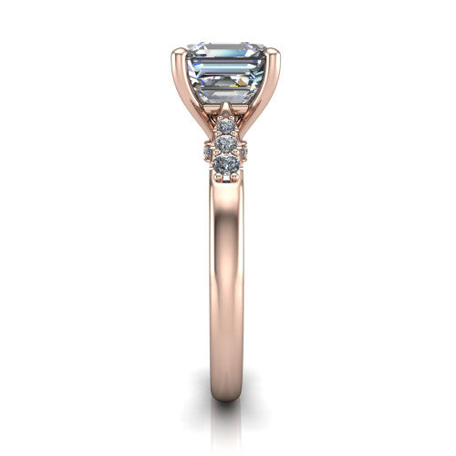 Jimena square emerald solitaire engagement ring in 14K Rose Gold, side profile showing the pav&eacute; shoulders, filigree under-gallery, and tapered band