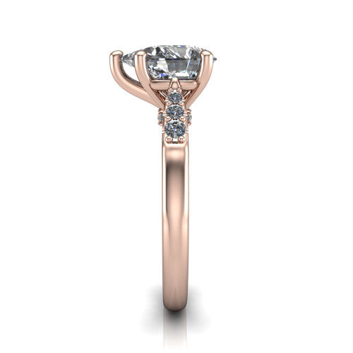 Jimena pear solitaire engagement ring in 18K Rose Gold, side profile showing the pav&eacute; shoulders, filigree under-gallery, and tapered band