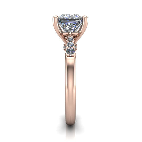 Jimena princess solitaire engagement ring in 18K Rose Gold, side profile showing the pav&eacute; shoulders, filigree under-gallery, and tapered band