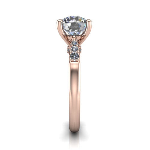Jimena round solitaire engagement ring in 14K Rose Gold, side profile showing the pav&eacute; shoulders, filigree under-gallery, and tapered band