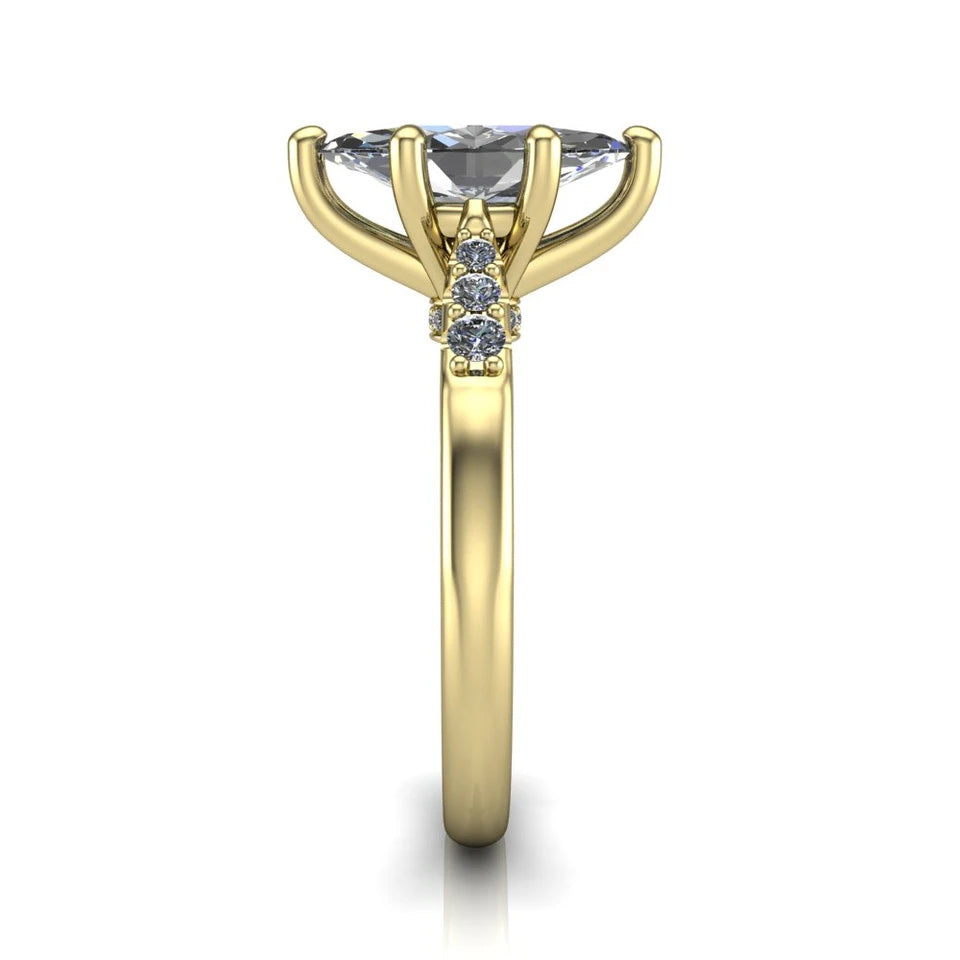 Jimena marquise solitaire engagement ring in 18K Yellow Gold, side profile showing the pav&eacute; shoulders, filigree under-gallery, and tapered band