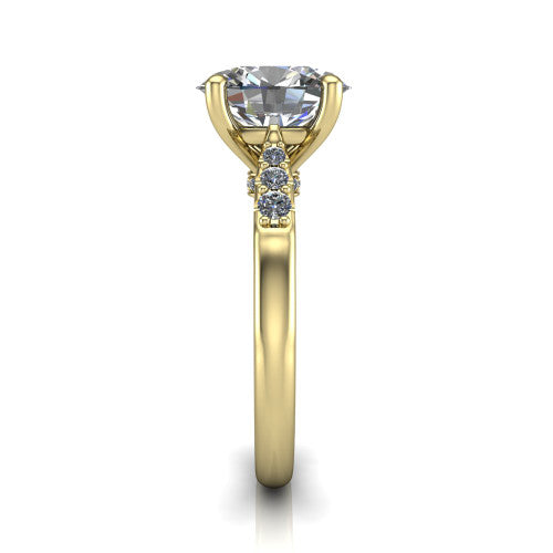 Jimena oval solitaire engagement ring in 18K Yellow Gold, side profile showing the pav&eacute; shoulders, filigree under-gallery, and tapered band