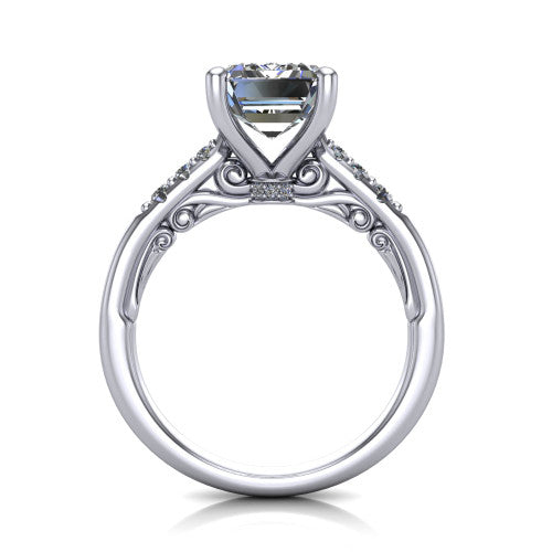 Jimena emerald solitaire engagement ring in 18K White Gold, through-finger front profile showing the filigree scroll gallery beneath the emerald center