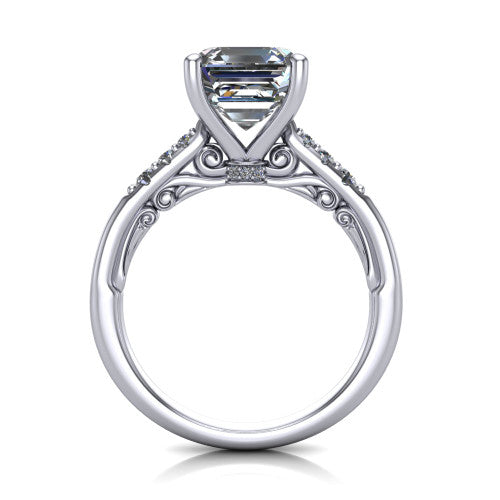 Jimena square emerald solitaire engagement ring in Platinum, through-finger front profile showing the filigree scroll gallery beneath the square emerald center