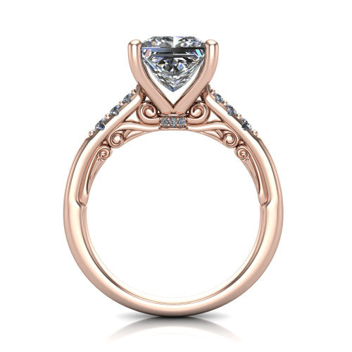 Jimena princess solitaire engagement ring in 18K Rose Gold, through-finger front profile showing the filigree scroll gallery beneath the princess center