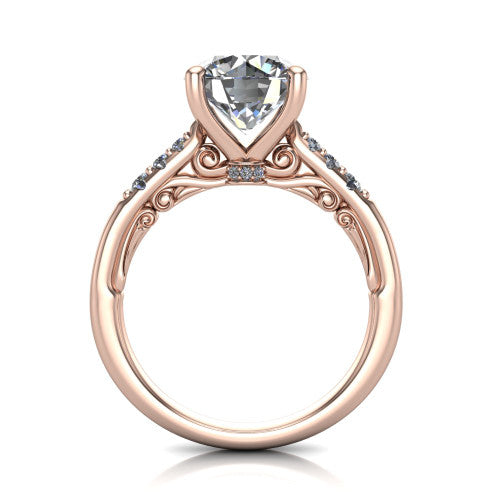 Jimena round solitaire engagement ring in 18K Rose Gold, through-finger front profile showing the filigree scroll gallery beneath the round center