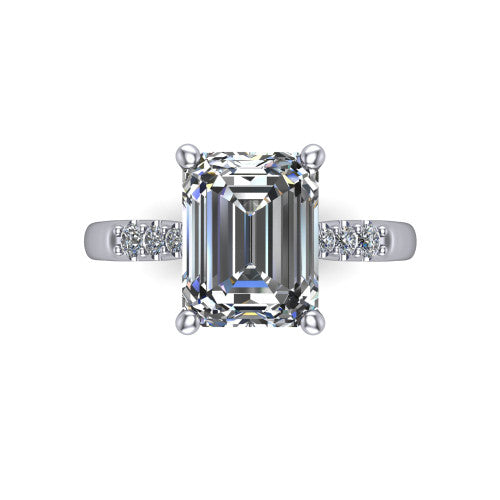 Jimena emerald solitaire engagement ring in 14K White Gold, top-down view showing the unhaloed emerald center and the pav&eacute; diamond shoulders