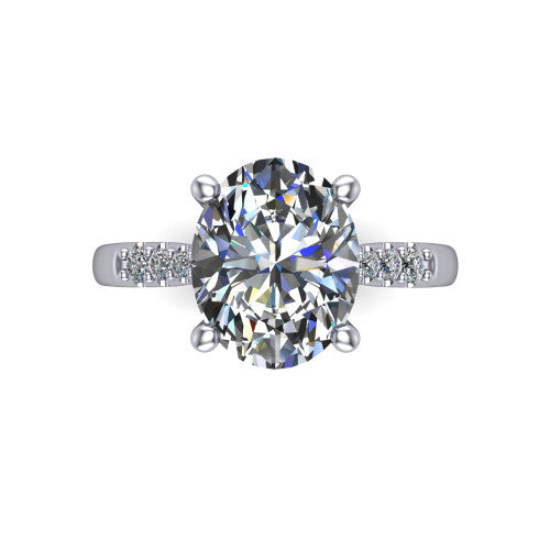 Jimena oval solitaire engagement ring in Platinum, top-down view showing the unhaloed oval center and the pav&eacute; diamond shoulders