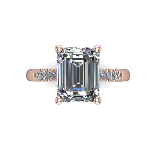 Jimena emerald solitaire engagement ring in 18K Rose Gold, top-down view showing the unhaloed emerald center and the pav&eacute; diamond shoulders