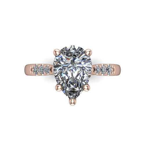 Jimena pear solitaire engagement ring in 14K Rose Gold, top-down view showing the unhaloed pear center and the pav&eacute; diamond shoulders