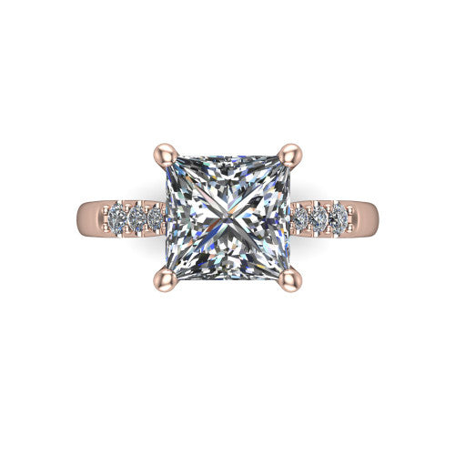 Jimena princess solitaire engagement ring in 14K Rose Gold, top-down view showing the unhaloed princess center and the pav&eacute; diamond shoulders