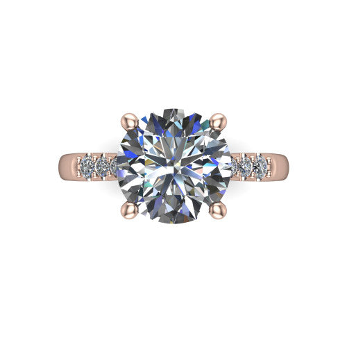 Jimena round solitaire engagement ring in 14K Rose Gold, top-down view showing the unhaloed round center and the pav&eacute; diamond shoulders