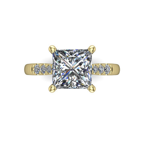 Jimena princess solitaire engagement ring in 14K Yellow Gold, top-down view showing the unhaloed princess center and the pav&eacute; diamond shoulders