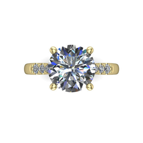 Jimena round solitaire engagement ring in 14K Yellow Gold, top-down view showing the unhaloed round center and the pav&eacute; diamond shoulders