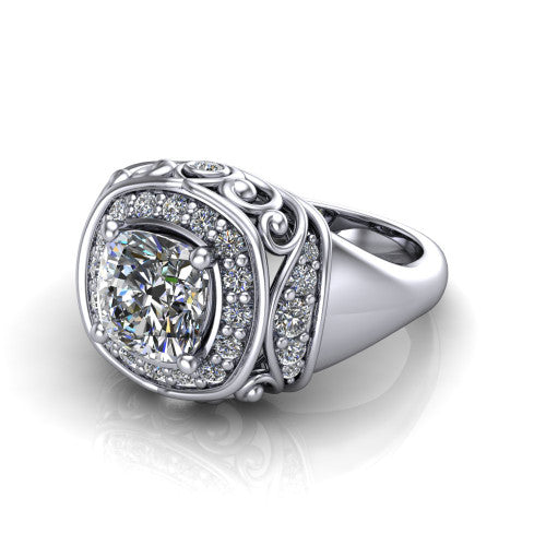Cassidy cushion vintage halo engagement ring in Platinum, three-quarter perspective showing the cushion center in a double pav&eacute; halo with filigree scrollwork above a plain band