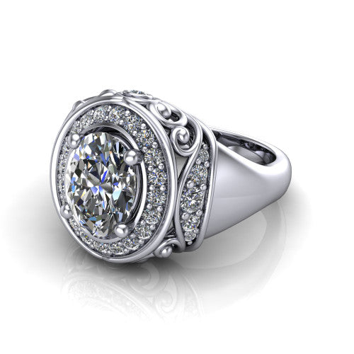 Cassidy oval vintage halo engagement ring in Platinum, three-quarter perspective showing the oval center in a double pav&eacute; halo with filigree scrollwork above a plain band