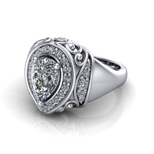 Cassidy pear vintage halo engagement ring in Platinum, three-quarter perspective showing the pear center in a double pav&eacute; halo with filigree scrollwork above a plain band