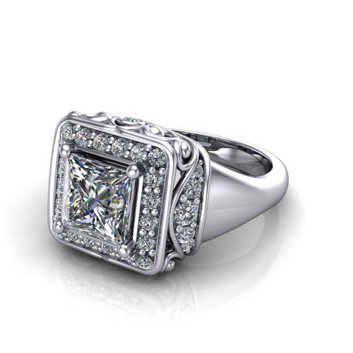 Cassidy princess vintage halo engagement ring in 18K White Gold, three-quarter perspective showing the princess center in a double pav&eacute; halo with filigree scrollwork above a plain band