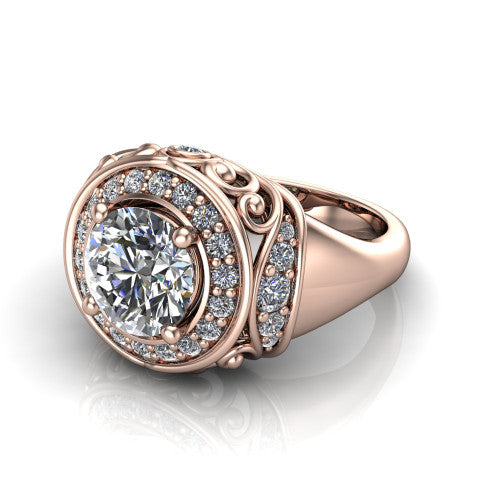 Cassidy round vintage halo engagement ring in 18K Rose Gold, three-quarter perspective showing the round center in a double pav&eacute; halo with filigree scrollwork above a plain band