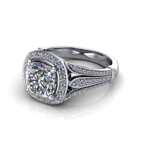 Joy cushion halo engagement ring in Platinum, three-quarter perspective showing the cushion center in a squared pav&eacute; halo above a pav&eacute; split shank