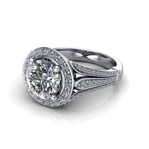 Joy round halo engagement ring in 18K White Gold, three-quarter perspective showing the round center in a squared pav&eacute; halo above a pav&eacute; split shank