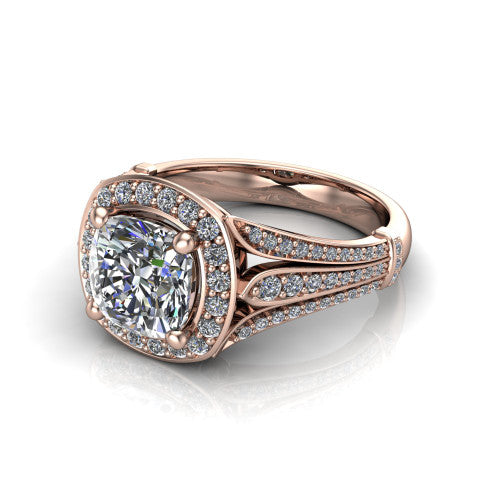 Joy cushion halo engagement ring in 18K Rose Gold, three-quarter perspective showing the cushion center in a squared pav&eacute; halo above a pav&eacute; split shank