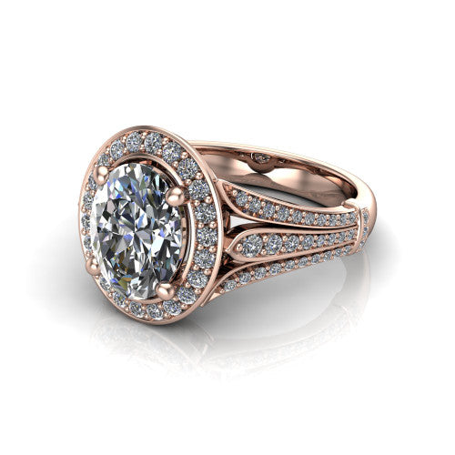 Joy oval halo engagement ring in 14K Rose Gold, three-quarter perspective showing the oval center in a squared pav&eacute; halo above a pav&eacute; split shank