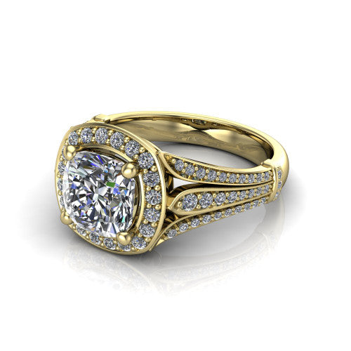 Joy cushion halo engagement ring in 18K Yellow Gold, three-quarter perspective showing the cushion center in a squared pav&eacute; halo above a pav&eacute; split shank