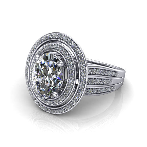 Stephanie oval double halo engagement ring in Platinum, three-quarter perspective showing the oval center in a double pav&eacute; halo above a pav&eacute; split shank