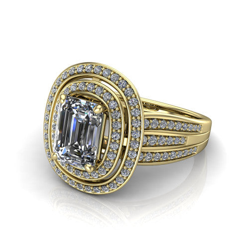 Stephanie emerald double halo engagement ring in 14K Yellow Gold, three-quarter perspective showing the emerald center in a double pav&eacute; halo above a pav&eacute; split shank