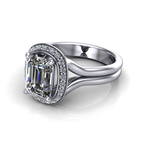 Selah emerald halo engagement ring in 18K White Gold, three-quarter perspective showing the emerald center in a cushion-shaped pav&eacute; halo above a split shank