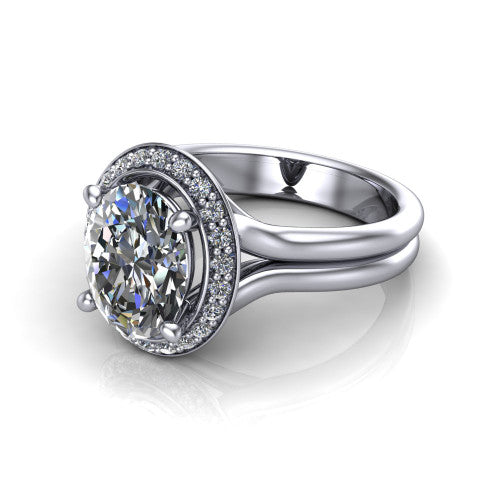 Selah oval halo engagement ring in 14K White Gold, three-quarter perspective showing the oval center in a cushion-shaped pav&eacute; halo above a split shank