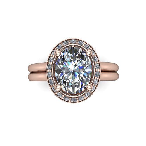 Selah oval halo engagement ring in 18K Rose Gold, top-down view showing the cushion pav&eacute; halo framing the oval center from above