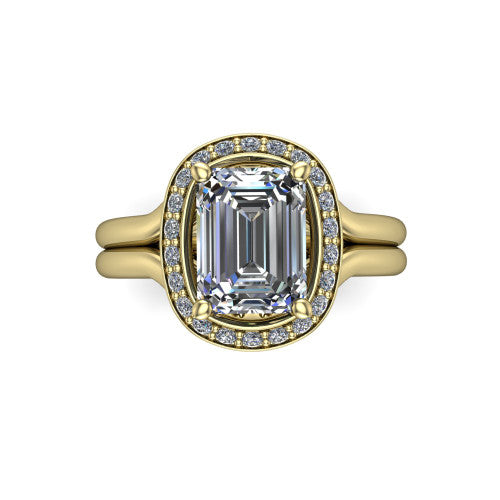 Selah emerald halo engagement ring in 18K Yellow Gold, top-down view showing the cushion pav&eacute; halo framing the emerald center from above