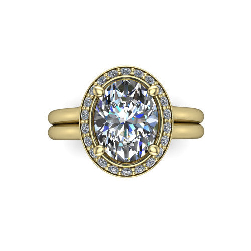 Selah oval halo engagement ring in 14K Yellow Gold, top-down view showing the cushion pav&eacute; halo framing the oval center from above