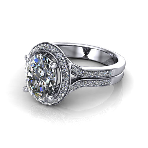Serena oval halo engagement ring in 18K White Gold, three-quarter perspective showing the oval center in a cushion-shaped pav&eacute; halo above a split shank